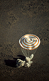 Soyuz parachutes fully deployed during landing